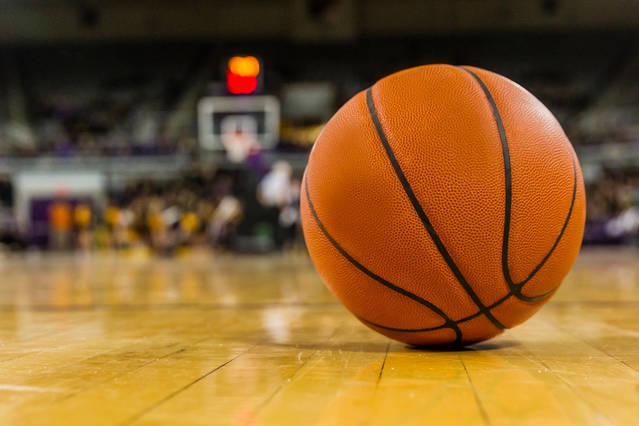 Basketball on court floor